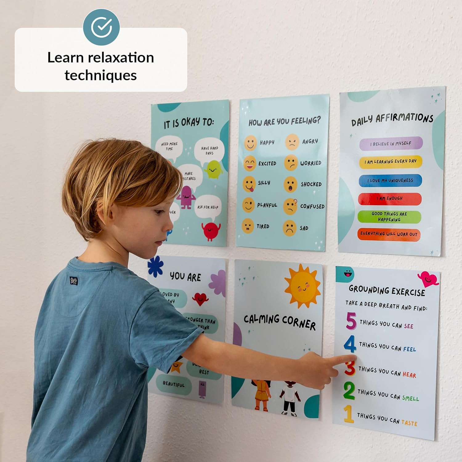 Child interacting with educational posters on a wall, focusing on relaxation techniques.